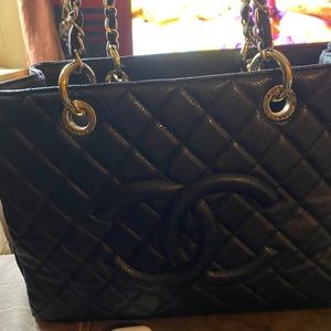 Gold tone qith dust bag like chanel bag